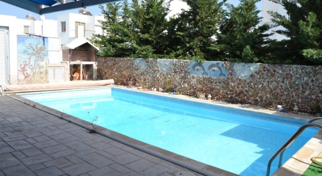 Two bedroom beach house for sale in Pervolia with private pool only two minutes walk to the beach
