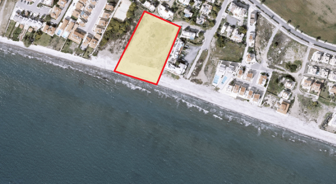 Beach front land for sale in Pervolia.