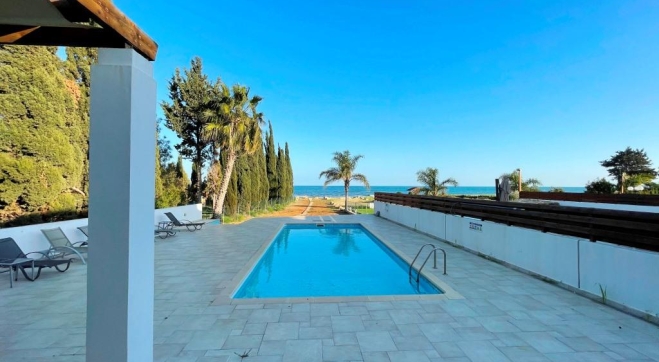 4 bed villa on the beach for sale in Pervolia.
